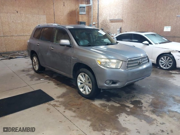 2009 Toyota Highlander Hybrid Limited with VIN JTEEW44A292032380, listed as a IAAI auction lot 41548361 with 253,079 mi miles. Bid and sale history available at carsss.com. Image 1.
