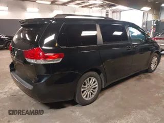 2012 Toyota Sienna XLE AAS with VIN 5TDYK3DCXCS208178, listed as a IAAI auction lot 41788262 with 329,823 mi miles and . Bid and sale history available at carsss.com. Image 4.