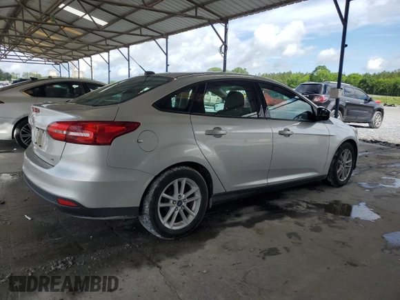 2018 Ford Focus SE z VIN 1FADP3F25JL265168, wystawiony jako Copart lot #56541895 z przebiegiem Nie podano mil oraz Szkoda całkowita • Salvage title. Historia ofert i sprzedaży dostępna na DreamBid. Obrazek 3.