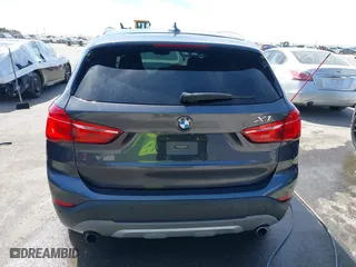 2017 BMW X1 xDrive28i with VIN WBXHT3Z33H4A65198, listed as a IAAI auction lot 41798503 with 88,951 mi miles. Bid and sale history available at carsss.com. Image 16.