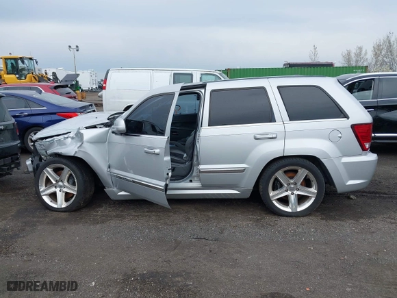 2007 Jeep Grand Cherokee SRT-8 with VIN 1J8HR78367C649237, listed as a IAAI auction lot 42019555 with 101,967 mi miles. Bid and sale history available at carsss.com. Image 14.