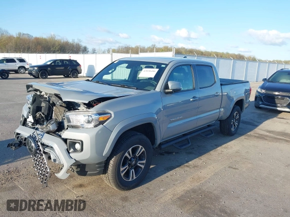 2018 Toyota Tacoma SR5 with VIN 3TMDZ5BN3JM054548, listed as a IAAI auction lot 42038480 with 122,242 mi miles and . Bid and sale history available at DreamBid. Image 17.