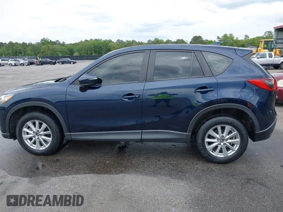 2016 Mazda CX-5 Sport with VIN JM3KE2BY0G0850298, listed as a IAAI auction lot 42107007 with 97,478 mi miles. Bid and sale history available at carsss.com. Image 14.