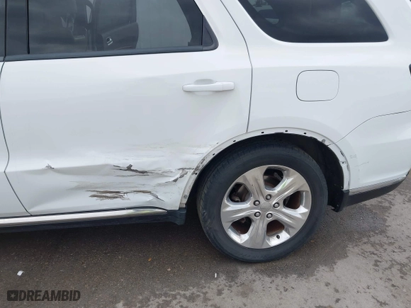 2014 Dodge Durango Limited with VIN 1C4RDHDG2EC318144, listed as a IAAI auction lot 41712791 with 124,569 mi miles. Bid and sale history available at carsss.com. Image 6.