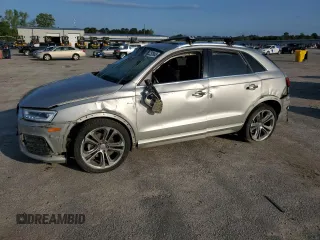 2016 Audi Q3 Prestige z VIN WA1GFCFS1GR009409, wystawiony jako Copart lot #52352845 z przebiegiem Nie podano mil oraz Szkody całkowita. Historia ofert i sprzedaży dostępna na DreamBid. Obrazek 1.