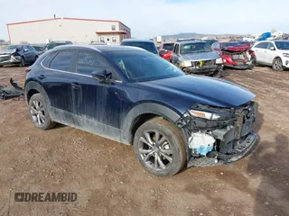 2023 Mazda CX-30 S Carbon Edition with VIN 3MVDMBCM2PM588506, listed as a IAAI auction lot 41728912 with 25,030 mi miles and . Bid and sale history available at DreamBid. Image 1.
