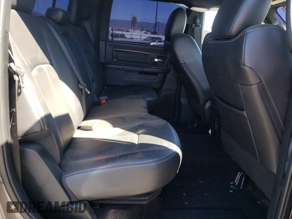 2018 Ram 1500 Rebel with VIN 1C6RR7YT1JS161619, listed as a Copart auction lot 60226061 with 49,567 mi miles and Salvage Title. Bid and sale history available at carsss.com. Image 6.