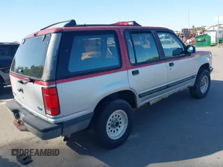1992 Ford Explorer Eddie Bauer with VIN 1FMDU34X8NUB56927, listed as a IAAI auction lot 42330007 with Not provided miles and . Bid and sale history available at DreamBid. Image 4.