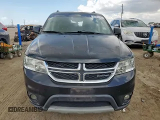 2012 Dodge Journey SXT with VIN 3C4PDCBG9CT208187, listed as a Copart auction lot 61969185 with 156,295 mi miles and Salvage title. Bid and sale history available at DreamBid. Image 5.