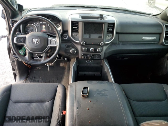 2021 Ram 1500 Big Horn z VIN 1C6RREFG2MN812561, wystawiony jako Copart lot #75305674 z przebiegiem Nie podano mil oraz Szkoda całkowita • Salvage title. Historia ofert i sprzedaży dostępna na DreamBid. Obrazek 8.