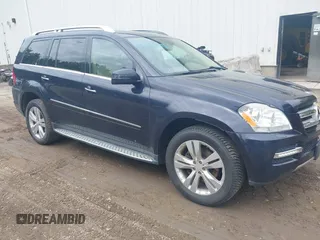 2012 Mercedes-Benz GL 450 z VIN 4JGBF7BE8CA763953, wystawiony jako IAAI lot #42402138 z przebiegiem 94 587 mil mil oraz . Historia ofert i sprzedaży dostępna na DreamBid. Obrazek 1.