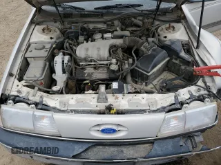 1991 Ford Taurus with VIN 1FACP52U9MG101093, listed as a Copart auction lot 45948105 with 594,696 mi miles and Salvage title. Bid and sale history available at DreamBid. Image 11.