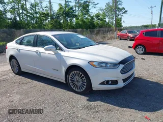 2014 Ford Fusion Titanium Hybrid with VIN 3FA6P0RU3ER279212, listed as a IAAI auction lot 42241465 with 155,841 mi miles and . Bid and sale history available at DreamBid. Image 1.