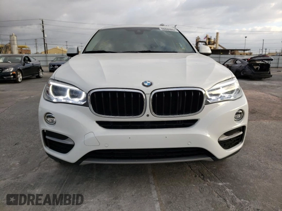 2016 BMW X6 sDrive35i with VIN 5UXKU0C52G0F93053, listed as a Copart auction lot 69660802 with 100,830 mi miles. Bid and sale history available at carsss.com. Image 5.