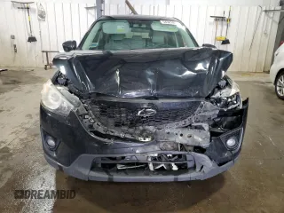2014 Mazda CX-5 Grand Touring with VIN JM3KE4DY0E0322606, listed as a Copart auction lot 54381815 with 216,022 mi miles and Salvage Title. Bid and sale history available at DreamBid. Image 5.