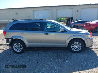 2017 Dodge Journey SXT z VIN 3C4PDCBG4HT563310, wystawiony jako IAAI lot #42190636 z przebiegiem 171 054 mil mil oraz . Historia ofert i sprzedaży dostępna na DreamBid. Obrazek 13.