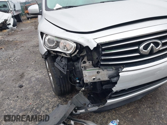 2015 Infiniti QX60 with VIN 5N1AL0MM4FC554511, listed as a IAAI auction lot 41065737 with 205,077 mi miles and . Bid and sale history available at DreamBid. Image 6.