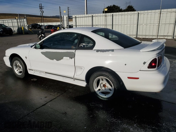 1997 Ford Mustang with VIN 1FALP4045VF120213, listed as a Copart auction lot 85335614 with 71,225 mi miles and Salvage Title. Bid and sale history available at carsss.com. Image 2.