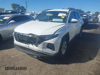 2023 Hyundai Tucson SEL with VIN 5NMJB3AE3PH258503, listed as a IAAI auction lot 41667615 with 51,879 mi miles and . Bid and sale history available at carsss.com. Image 17.