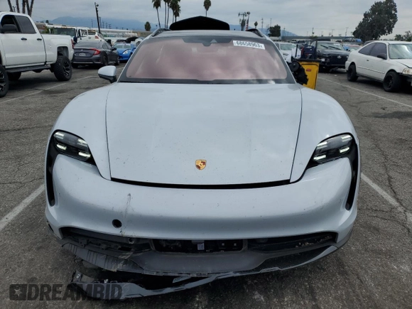 2023 Porsche Taycan 4 with VIN WP0BA2Y13PSA60032, listed as a Copart auction lot 68658963 with 4,572 mi miles and . Bid and sale history available at DreamBid. Image 5.