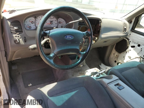 2001 Ford Explorer Sport z VIN 1FMYU60E41UA39699, wystawiony jako Copart lot #62336524 z przebiegiem 223 772 mil mil oraz Szkody całkowita. Historia ofert i sprzedaży dostępna na DreamBid. Obrazek 8.