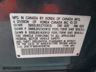 2004 Honda Pilot EX with VIN 2HKYF18644H516791, listed as a IAAI auction lot 41876348 with 291,358 mi miles. Bid and sale history available at carsss.com. Image 9.