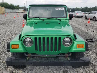 2004 Jeep Wrangler SE with VIN 1J4FA29124P769475, listed as a Copart auction lot 64371244 with 136,877 mi miles and Salvage title. Bid and sale history available at DreamBid. Image 5.