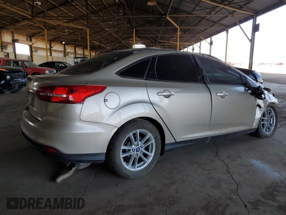 2017 Ford Focus SE with VIN 1FADP3F27HL303378, listed as a Copart auction lot 51862925 with 98,464 mi miles and Salvage Title. Bid and sale history available at DreamBid. Image 3.