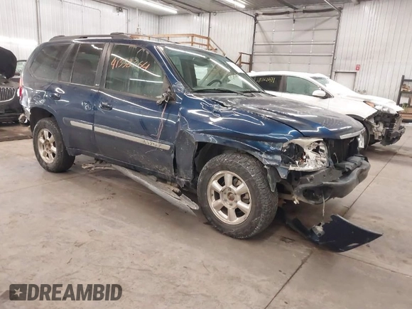 2002 GMC Envoy SLT with VIN 1GKDT13S022388743, listed as a IAAI auction lot 41338364 with 206,179 mi miles. Bid and sale history available at carsss.com. Image 1.