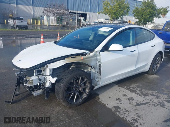 2021 Tesla Model 3 Long Range with VIN 5YJ3E1EB9MF055990, listed as a IAAI auction lot 41584065 with 49,147 mi miles and . Bid and sale history available at carsss.com. Image 18.