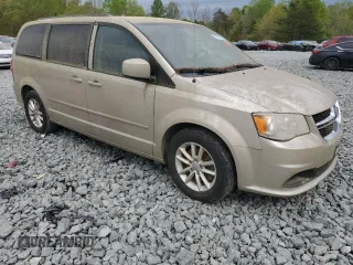 2014 Dodge Grand Caravan SXT 30th Anniversary with VIN 2C4RDGCG2ER478754, listed as a Copart auction lot 53162725 with 154,939 mi miles and Clean Title. Bid and sale history available at DreamBid. Image 4.