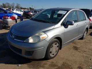 2009 Nissan Versa 1.8 S with VIN 3N1BC11E29L398542, listed as a IAAI auction lot 41689382 with 96,964 mi miles. Bid and sale history available at carsss.com. Image 2.