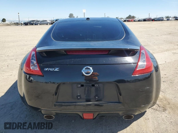 2013 Nissan 370Z Touring z VIN JN1AZ4EH4DM881576, wystawiony jako Copart lot #50645635 z przebiegiem 123 515 mil mil oraz Szkoda całkowita • Salvage title. Historia ofert i sprzedaży dostępna na DreamBid. Obrazek 6.
