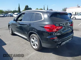 2019 BMW X3 sDrive30i with VIN 5UXTR7C5XKLR51471, listed as a IAAI auction lot 41718818 with 52,670 mi miles. Bid and sale history available at carsss.com. Image 3.