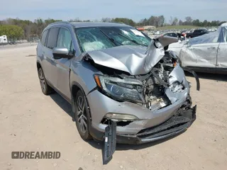 2017 Honda Pilot Touring with VIN 5FNYF6H98HB100335, listed as a IAAI auction lot 41907709 with 1 mi miles. Bid and sale history available at carsss.com. Image 1.