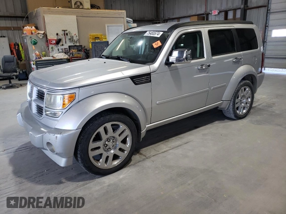 2008 Dodge Nitro R/T z VIN 1D8GU58618W151545, wystawiony jako Copart lot #75465574 z przebiegiem Nie podano mil oraz Szkoda całkowita • Salvage title. Historia ofert i sprzedaży dostępna na DreamBid. Obrazek 1.