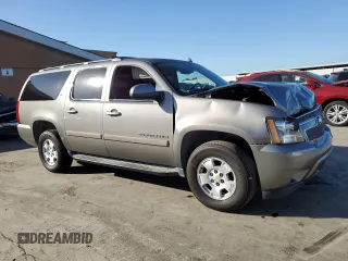 2009 Chevrolet Suburban LT w/2LT with VIN 1GNFK26359J119663, listed as a Copart auction lot 73777444 with 180,851 mi miles and Salvage Title. Bid and sale history available at carsss.com. Image 4.