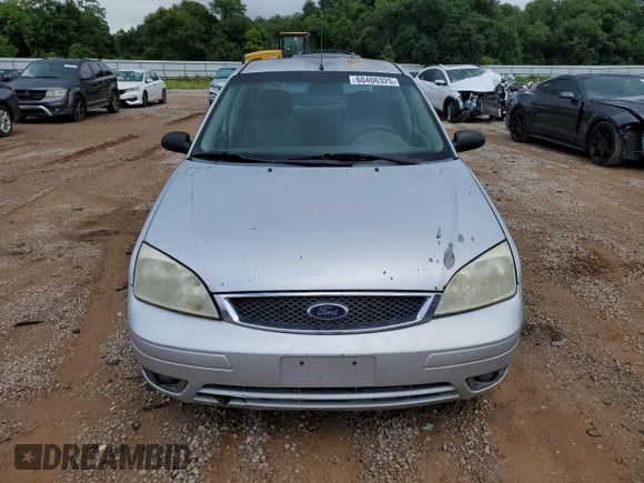 2006 Ford Focus S с VIN 1FAFP34N76W122783, выставлен на аукционе Copart как лот 60406325 с пробегом 290 434 миль миль и Списание • Salvage title. История ставок и продаж доступна на DreamBid. Изображение 5.