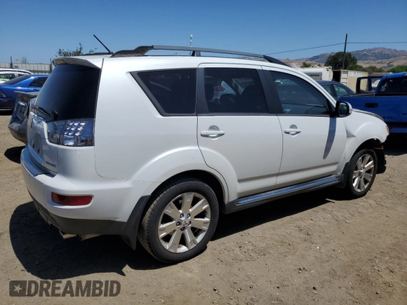 2012 Mitsubishi Outlander SE z VIN JA4AS3AW9CU031502, wystawiony jako Copart lot #57975515 z przebiegiem 115 602 mil mil oraz Tytuł czysty. Historia ofert i sprzedaży dostępna na DreamBid. Obrazek 3.