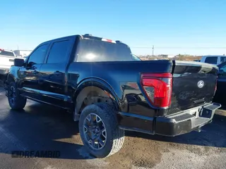 2024 Ford F-150 STX with VIN 1FTFW2L51RFA56163, listed as a IAAI auction lot 41311824 with 31,604 mi miles and . Bid and sale history available at carsss.com. Image 2.