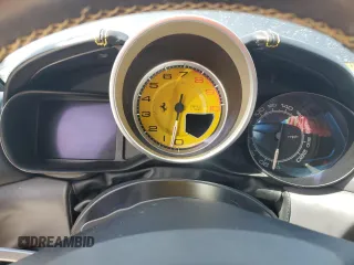 2015 Ferrari California T z VIN ZFF77XJA3F0206563, wystawiony jako Copart lot #73751534 z przebiegiem Nie podano mil oraz Szkody całkowita. Historia ofert i sprzedaży dostępna na DreamBid. Obrazek 9.