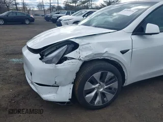2023 Tesla Model Y Long Range with VIN 7SAYGDEE3PA201719, listed as a IAAI auction lot 42048816 with Not Provided miles and . Bid and sale history available at DreamBid. Image 6.