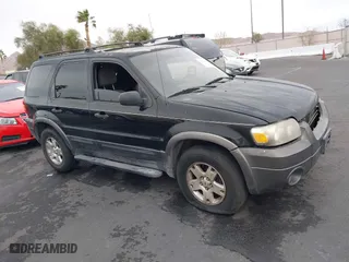 2006 Ford Escape XLT with VIN 1FMYU03156KA42961, listed as a IAAI auction lot 41820423 with 168,212 mi miles. Bid and sale history available at carsss.com. Image 1.