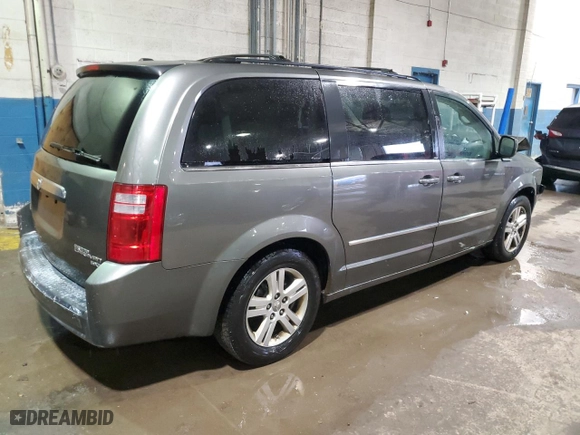 2010 Dodge Grand Caravan SXT with VIN 2D4RN5DX4AR403132, listed as a Copart auction lot 85802634 with 135,094 mi miles and Clean Title. Bid and sale history available at carsss.com. Image 3.