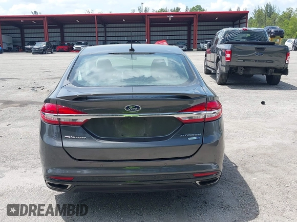 2018 Ford Fusion Titanium with VIN 3FA6P0D9XJR169657, listed as a IAAI auction lot 42392112 with 62,754 mi miles and . Bid and sale history available at DreamBid. Image 17.