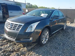 2013 Cadillac XTS Luxury with VIN 2G61P5S3XD9141306, listed as a IAAI auction lot 42034077 with 120,294 mi miles. Bid and sale history available at carsss.com. Image 17.