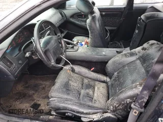 1992 Toyota MR2 z VIN JT2SW22N5N0058195, wystawiony jako Copart lot #74886194 z przebiegiem 158 816 mil mil oraz Nie do naprawy. Historia ofert i sprzedaży dostępna na DreamBid. Obrazek 7.