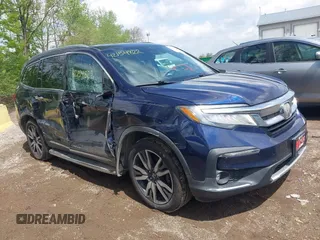 2019 Honda Pilot Touring 7-Passenger z VIN 5FNYF6H63KB000365, wystawiony jako IAAI lot #42154822 z przebiegiem 238 032 mil mil oraz . Historia ofert i sprzedaży dostępna na DreamBid. Obrazek 6.