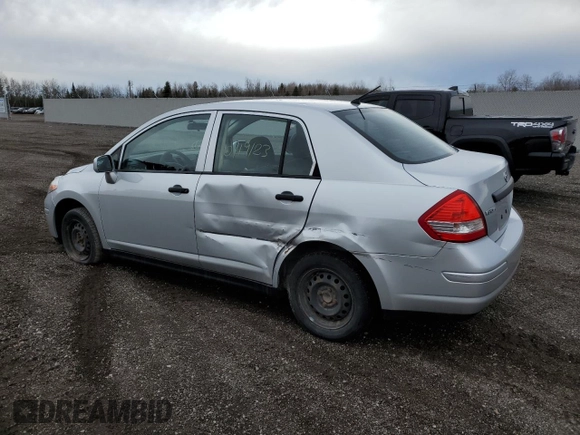 2010 Nissan Versa 1.6 with VIN 3N1CC1AP9AL355388, listed as a Copart auction lot 73171243 with 141,394 mi miles and Clean Title. Bid and sale history available at carsss.com. Image 2.