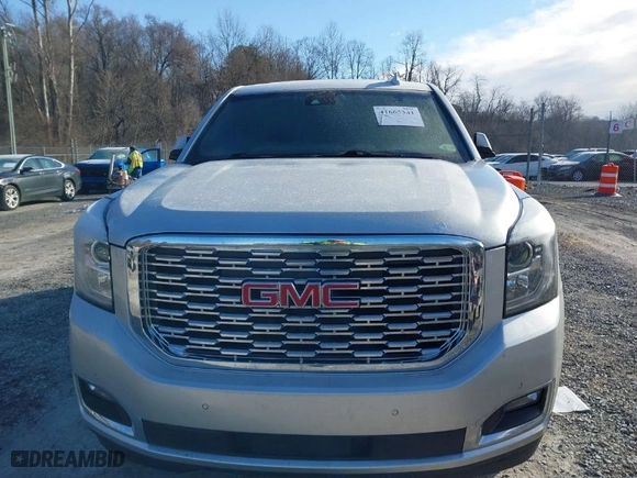 2019 GMC Yukon SLT with VIN 1GKS2BKC0KR107722, listed as a IAAI auction lot 41663341 with 111,782 mi miles. Bid and sale history available at carsss.com. Image 6.
